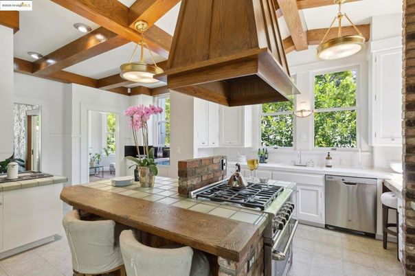 Interior, Kitchen, Pendant Lights, Recessed Lighting, Stainless Steel Appliances, Tile Countertops, Wooden Beams
