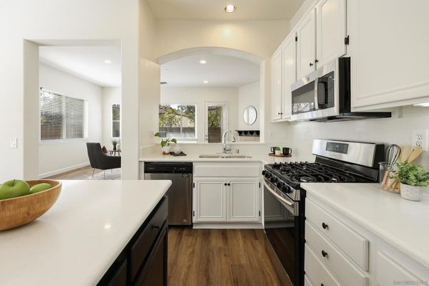 Dining room, Interior, Kitchen, Recessed Lighting, Stainless Steel Appliances, Wood Texture Flooring