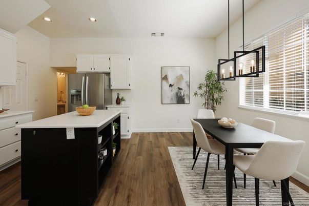 Dining room, Interior, Kitchen, Pendant Lights, Recessed Lighting, Stainless Steel Appliances, Wood Texture Flooring