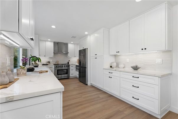Interior, Kitchen, Recessed Lighting, Stainless Steel Appliances, Wood Texture Flooring