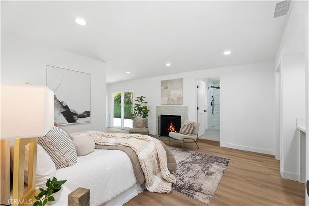 Bedroom, Fireplace, Interior, Recessed Lighting, Wood Texture Flooring