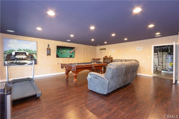 Billiard Table, Fitness Equipment, Game Room, Interior, Recessed Lighting, Wood Texture Flooring