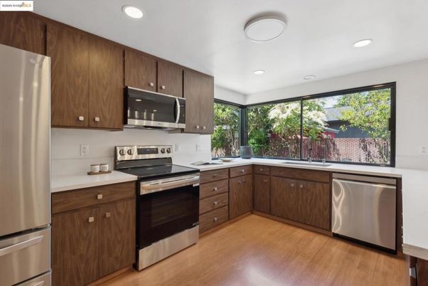 Interior, Kitchen, Recessed Lighting, Stainless Steel Appliances, Wood Texture Flooring