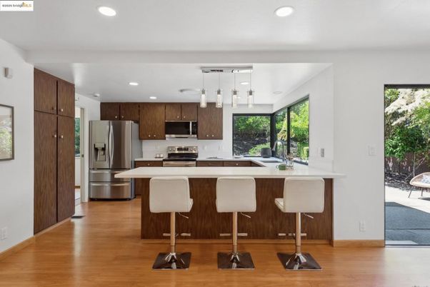 Interior, Kitchen, Pendant Lights, Recessed Lighting, Stainless Steel Appliances, Wood Texture Flooring
