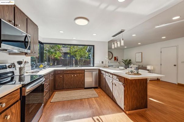 Interior, Kitchen, Pendant Lights, Recessed Lighting, Stainless Steel Appliances, Wood Texture Flooring