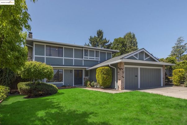 Attached, Backyard, Exterior, Facade, Brick Facade, Split Level