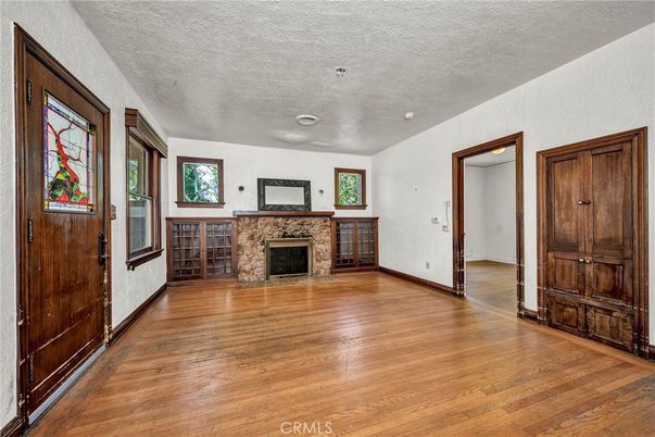 Empty room, Fireplace, Interior, Recessed Lighting, Wood Texture Flooring