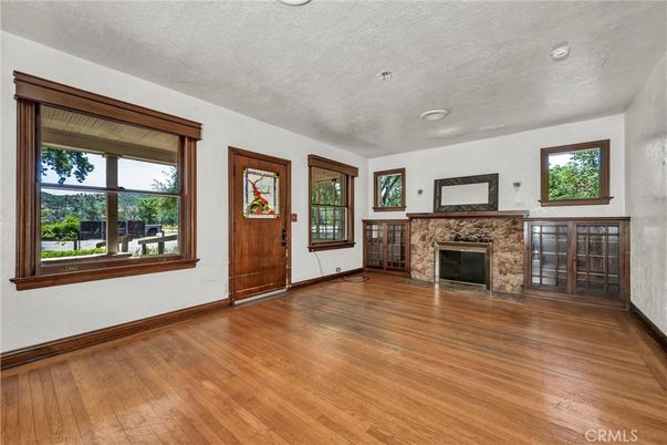 Empty room, Fireplace, Interior, Recessed Lighting, Wood Texture Flooring