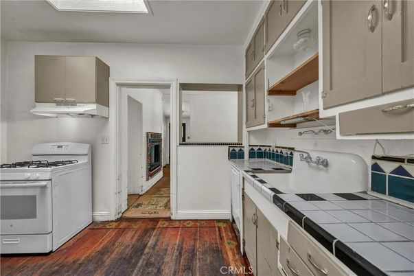 Interior, Kitchen, Tile Countertops, Wood Texture Flooring