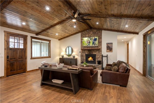 Fireplace, Interior, Living room, Recessed Lighting, Stone Walls, Wooden Beams, Wooden Ceilings, Wood Texture Flooring
