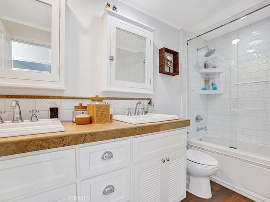 Bathroom, Dual Sink Vanities, Glass Shower, Interior, Wood Texture Flooring