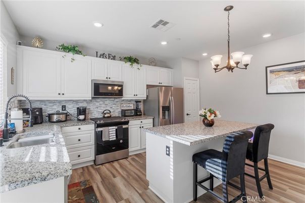 Chandelier, Interior, Kitchen, Recessed Lighting, Stainless Steel Appliances, Wood Texture Flooring