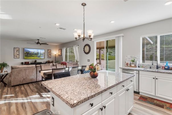 Chandelier, Dining room, Interior, Kitchen, Living room, Recessed Lighting, Wood Texture Flooring