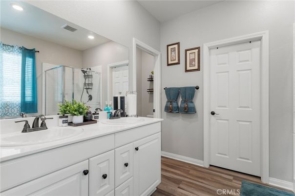 Bathroom, Dual Sink Vanities, Interior, Recessed Lighting, Wood Texture Flooring