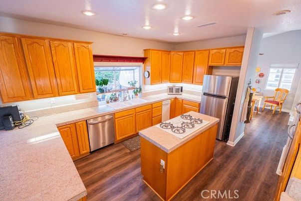 Dining room, Interior, Kitchen, Recessed Lighting, Stainless Steel Appliances, Wood Texture Flooring