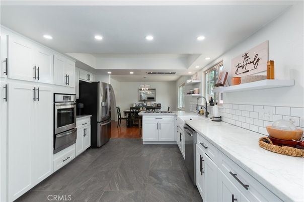 Dining room, Interior, Kitchen, Recessed Lighting, Stainless Steel Appliances, Wood Texture Flooring