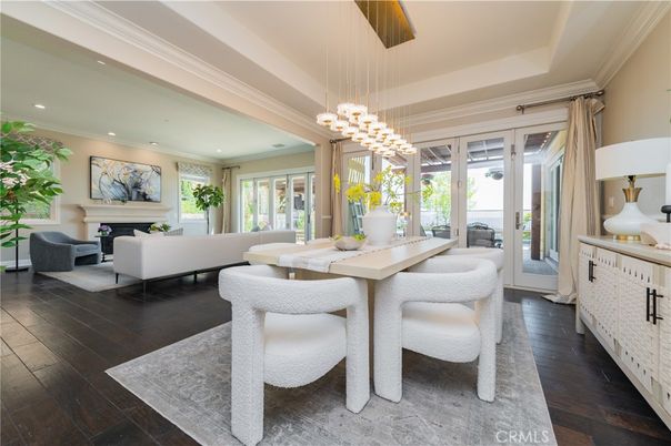 Dining room, Fireplace, Interior, Living room, Pendant Lights, Recessed Lighting, Wood Texture Flooring