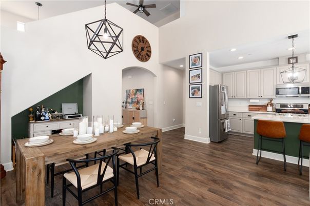 Dining room, Interior, Kitchen, Pendant Lights, Recessed Lighting, Stainless Steel Appliances, Wood Texture Flooring