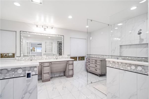 Bathroom, Dual Sink Vanities, Glass Shower, Interior, Marble, Marble Walls, Recessed Lighting