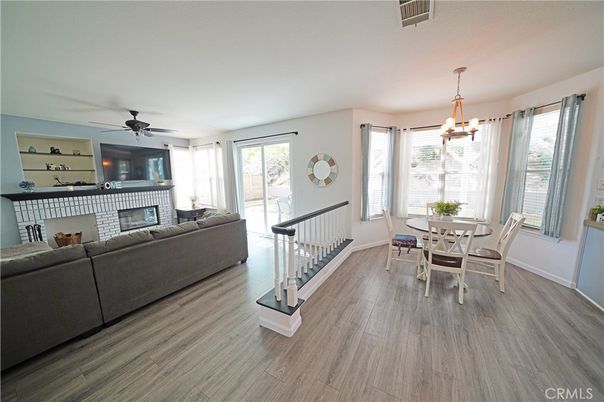 Dining room, Fireplace, Interior, Living room, Pendant Lights, Wood Texture Flooring