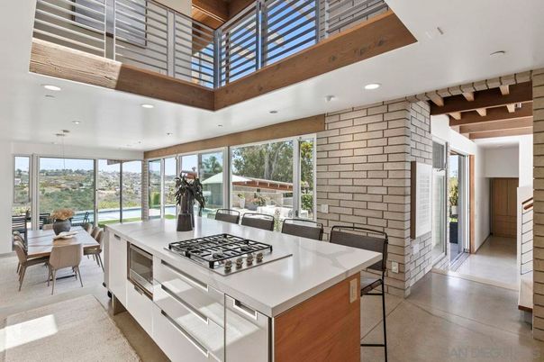 Dining room, Fireplace, Interior, Kitchen, Pendant Lights, Recessed Lighting, Stainless Steel Appliances, Stone Walls, Wooden Beams