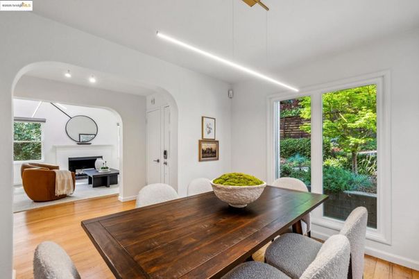 Dining room, Fireplace, Interior, Living room, Pendant Lights, Recessed Lighting, Wood Texture Flooring