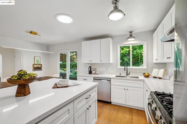 Interior, Kitchen, Recessed Lighting, Stainless Steel Appliances, Wood Texture Flooring