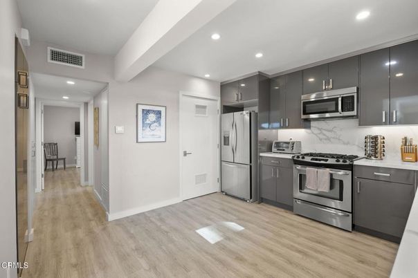 Interior, Kitchen, Recessed Lighting, Stainless Steel Appliances, Wood Texture Flooring