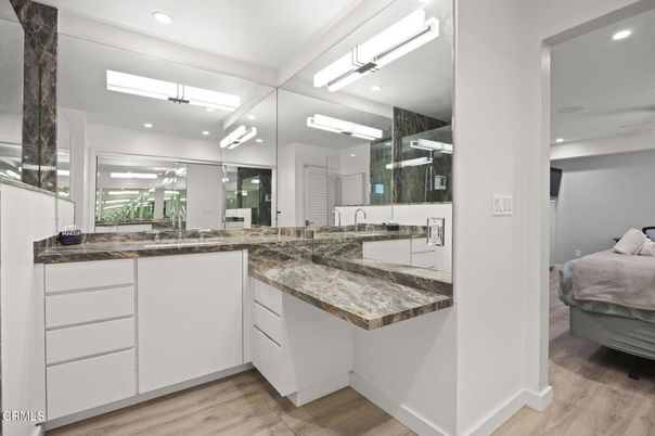 Bathroom, Dual Sink Vanities, Interior, Recessed Lighting, Wood Texture Flooring