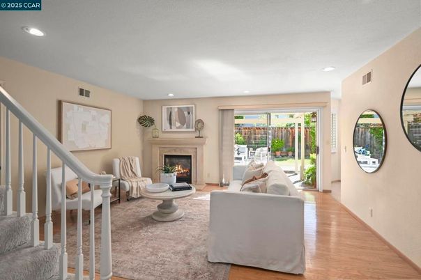 Fireplace, Interior, Living room, Recessed Lighting, Wood Texture Flooring