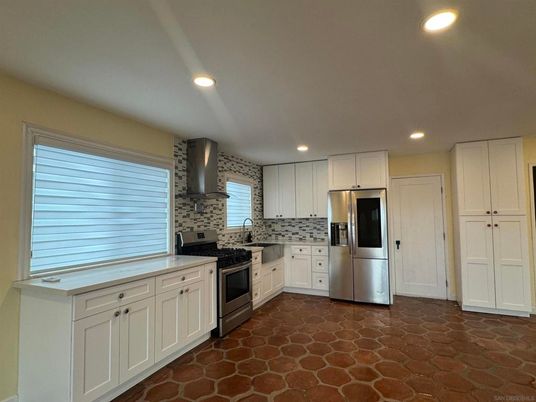Interior, Kitchen, Recessed Lighting, Stainless Steel Appliances, Stone Walls, Washer