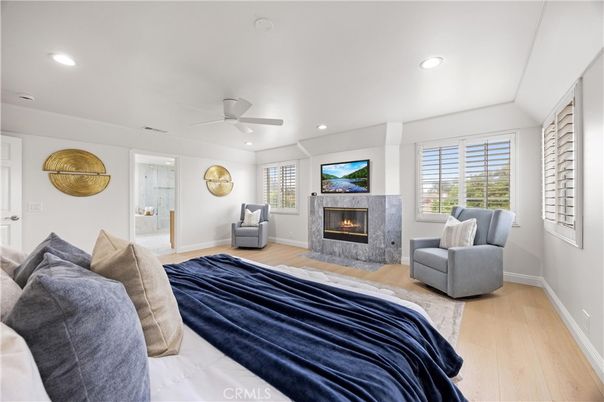 Bedroom, Fireplace, Interior, Recessed Lighting, Wood Texture Flooring