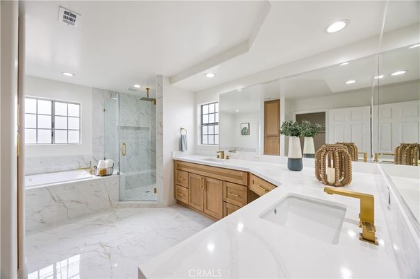Bathroom, Dual Sink Vanities, Glass Shower, Interior, Marble, Marble Walls, Recessed Lighting