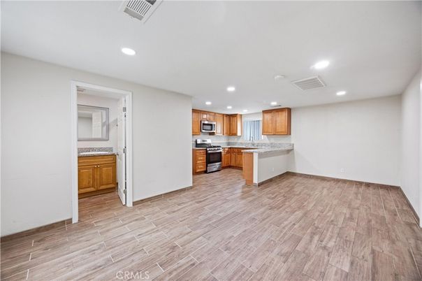 Interior, Kitchen, Recessed Lighting, Stainless Steel Appliances, Wood Texture Flooring