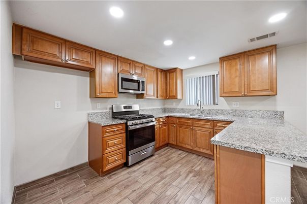 Interior, Kitchen, Recessed Lighting, Stainless Steel Appliances, Wood Texture Flooring