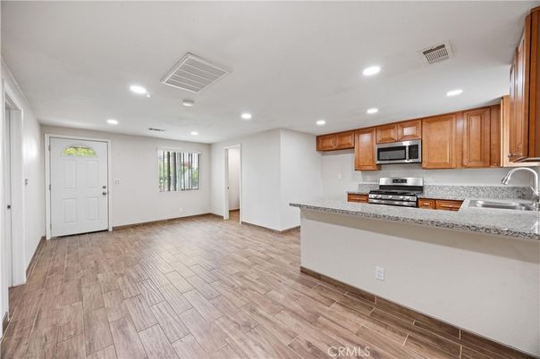 Interior, Kitchen, Recessed Lighting, Stainless Steel Appliances, Wood Texture Flooring