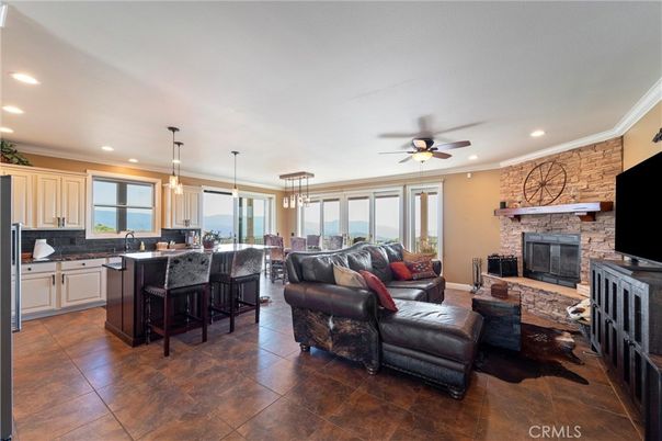 Dining room, Fireplace, Interior, Kitchen, Living room, Pendant Lights, Recessed Lighting, Stone Walls, Water