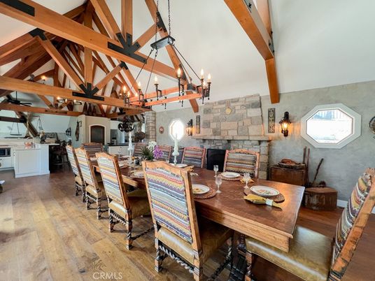Chandelier, Dining room, Fireplace, Interior, Kitchen, Pendant Lights, Stone Walls, Wooden Beams, Wood Texture Flooring