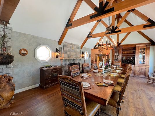 Chandelier, Dining room, Fireplace, Interior, Wooden Beams, Wood Texture Flooring
