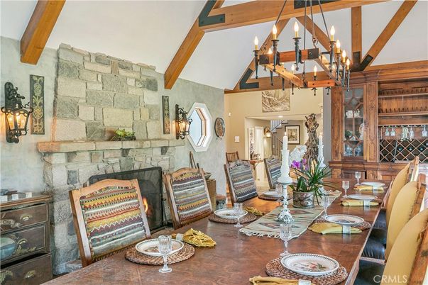 Chandelier, Dining room, Fireplace, Interior, Pendant Lights, Stone Walls, Wooden Beams