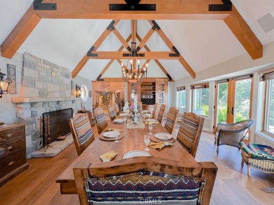 Chandelier, Dining room, Fireplace, Interior, Stone Walls, Wooden Beams, Wood Texture Flooring