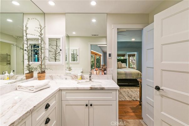 Bathroom, Bedroom, Dual Sink Vanities, Interior, Recessed Lighting, Wood Texture Flooring
