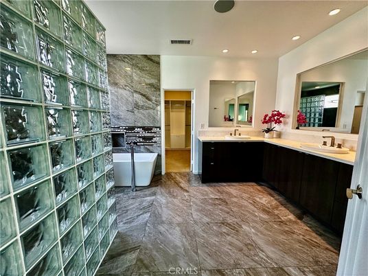 Bathroom, Dual Sink Vanities, Free Standing Baths, Interior, Marble, Marble Walls, Recessed Lighting