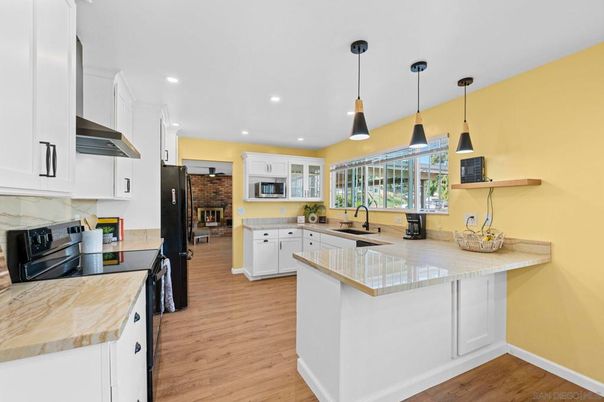 Fireplace, Interior, Kitchen, Pendant Lights, Recessed Lighting, Wood Texture Flooring