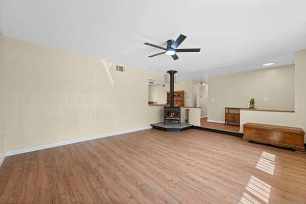 Empty room, Fireplace, Interior, Recessed Lighting, Wood Texture Flooring