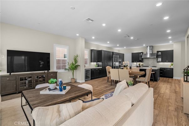 Dining room, Interior, Kitchen, Living room, Recessed Lighting, Stainless Steel Appliances, Wood Texture Flooring