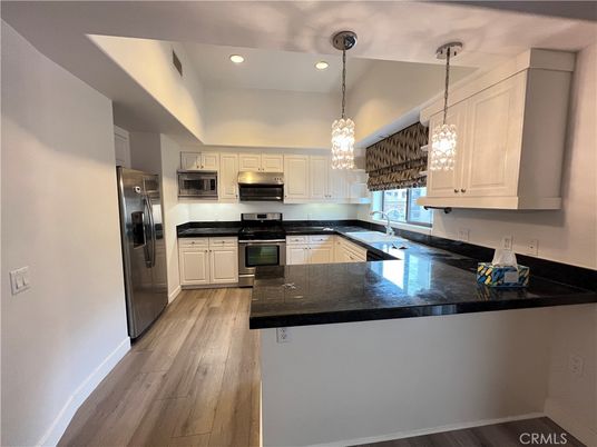 Interior, Kitchen, Pendant Lights, Recessed Lighting, Stainless Steel Appliances, Wood Texture Flooring