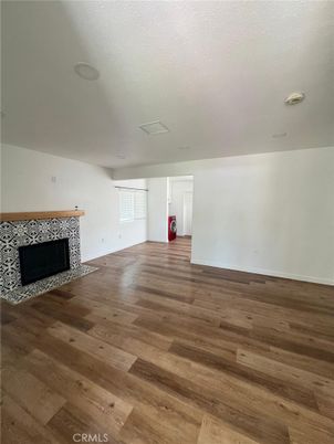 Empty room, Fireplace, Interior, Recessed Lighting, Wood Texture Flooring