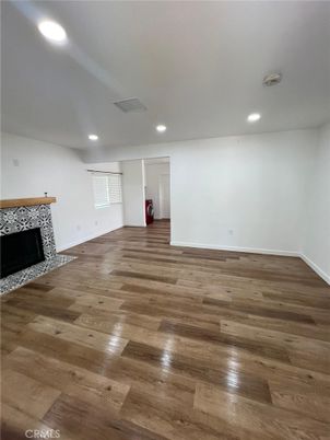 Empty room, Fireplace, Interior, Recessed Lighting, Wood Texture Flooring