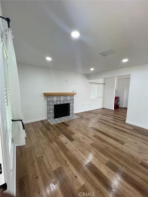 Empty room, Fireplace, Interior, Recessed Lighting, Wood Texture Flooring